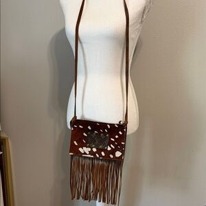 Axis hair on hide fringe crossbody Purse.